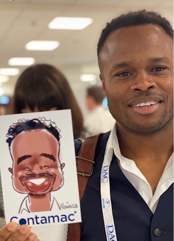 Joe with a caricature of himself from the Contamac booth